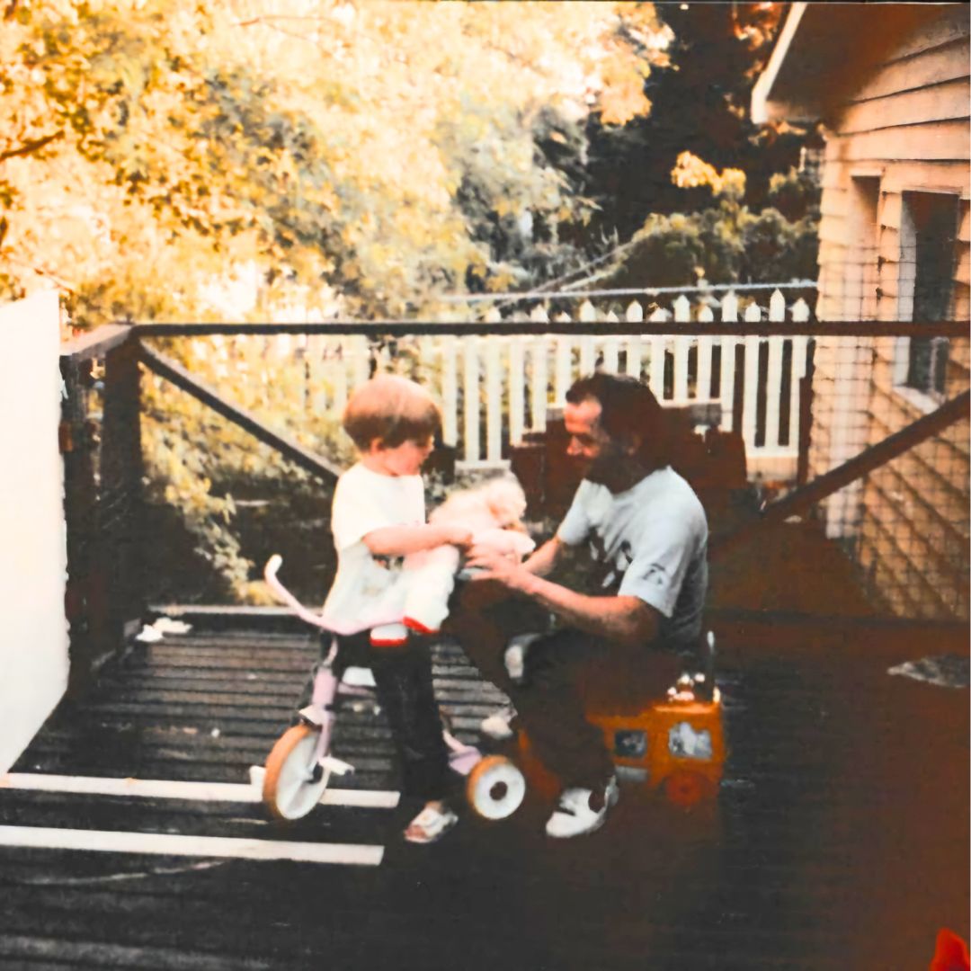 My Uncle and I playing on the back deck.